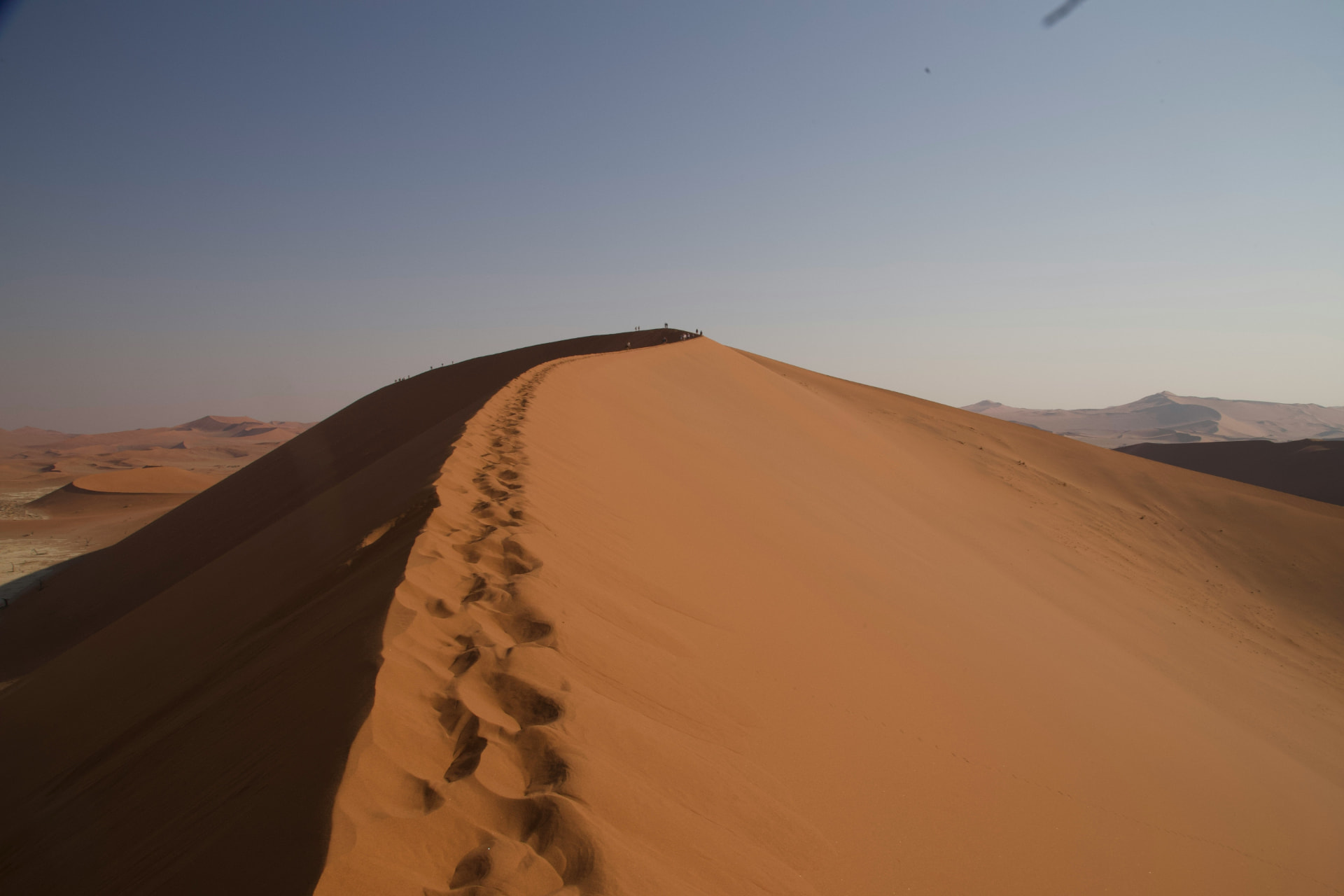 Footprints along the crest of Dune 45 in the Namib Sand Sea.